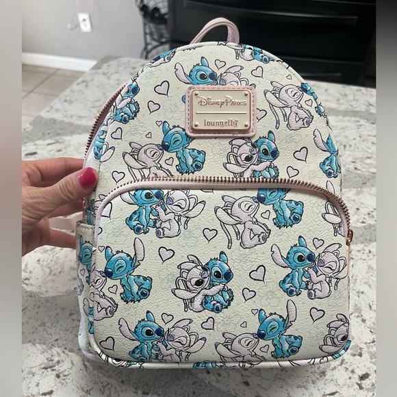 Loungefly Handbags - Loungefly Disney Parks angel and stitch backpack